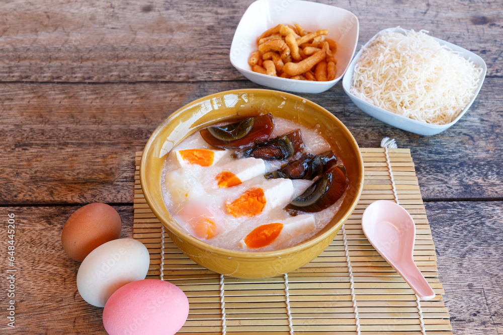 Congee, Rice porridge with minced pork, boiled egg, and century egg. Such a special Thai and Chinese breakfast ever Congee, Rice porridge with minced pork, boiled egg, and century egg. Such a special Thai and Chinese breakfast ever