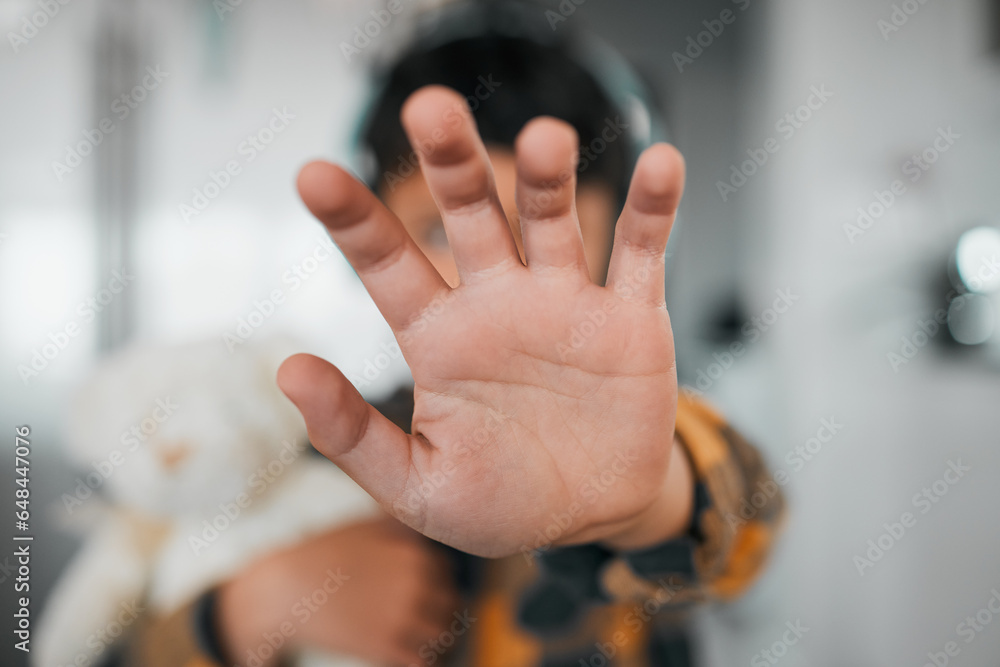 Child, stop and hand closeup for protest, rejection and sign for prohibition of domestic violence. Palm, warning and kid against discrimination, racism and bullying at school, abuse and harassment