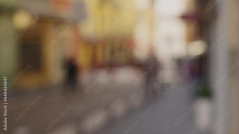 Defocused background of Old city of Nice with vibrant walls and narrow streets Defocused background of Old city of Nice with vibrant walls and narrow streets