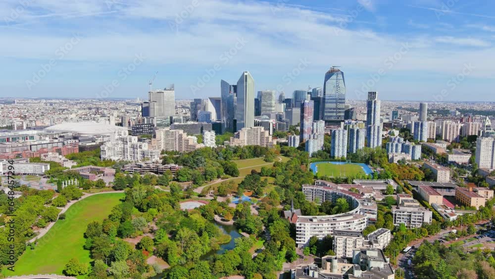 Paris: Aerial view of skyscraper skyline of La Defense, major business district in capital city of France from Parc André Malraux park, sunny day with blue sky—landscape panorama of Europe from above