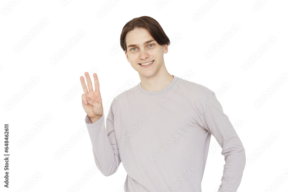 Portrait of cheerful young man smiling looking at camera showing three finger up over white background. Portrait of cheerful young man smiling looking at camera showing three finger up over white background.