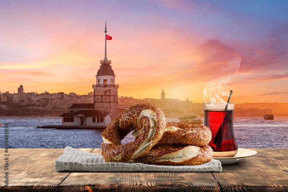 Obraz premium Turkish Bagel, Traditional Pastries of Turkey and View of Istanbul Maiden's Tower