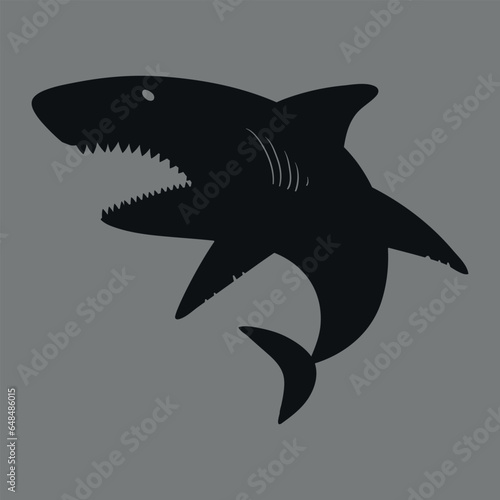 Black silhouette of a dangerous shark.  Vector on gray background.