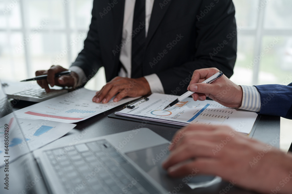 Asian business advisor meeting to analyze and discuss the situation on the financial report in the meeting room. brainstorming, discussing, and analyzing business strategy. Financial advisor concept Asian business advisor meeting to analyze and discuss the situation on the financial report in the meeting room. brainstorming, discussing, and analyzing business strategy. Financial advisor concept