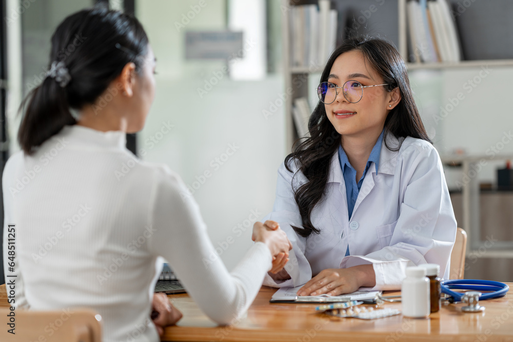 Doctor shakes hands with his patient in the office, after successful treatment of specialty and delighted patients returned home, a handshake concept to congratulate. Doctor shakes hands with his patient in the office, after successful treatment of specialty and delighted patients returned home, a handshake concept to congratulate.