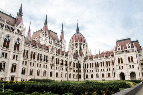 Budapest, Hungary, August 15, 2023. Beautiful Facade and Dome of Hungarian Parliament Building.