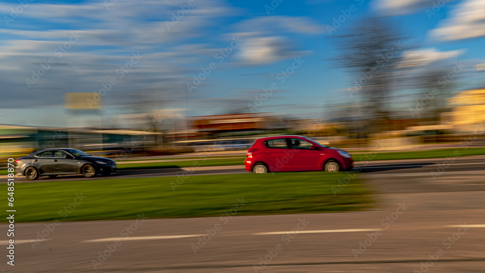 22 april 2023.Paning shot -car in motion with a blurred background.