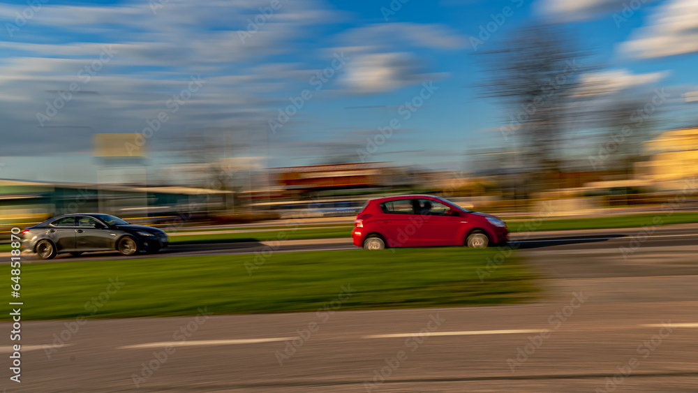 22 april 2023.Paning shot -car in motion with a blurred background. 22 april 2023.Paning shot -car in motion with a blurred background.