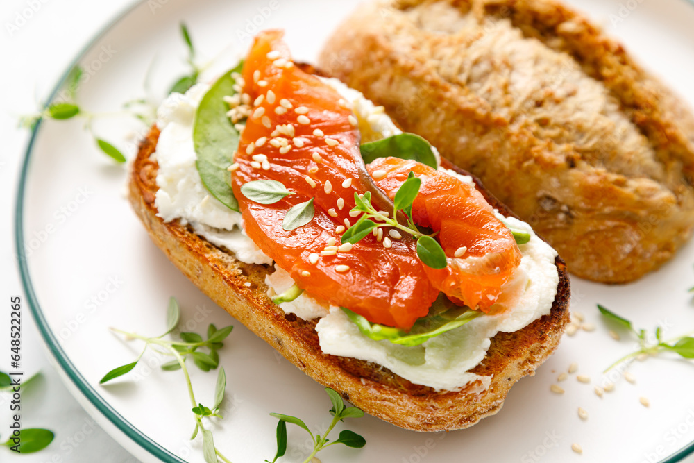 Salmon salted sandwich with spinach and cream cheese