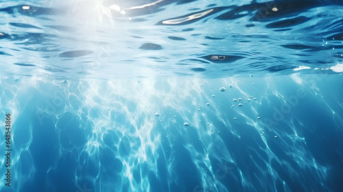 A beautiful background image resembling the texture of a water surface, featuring captivating light reflections and glares in varying shades of light blue.
