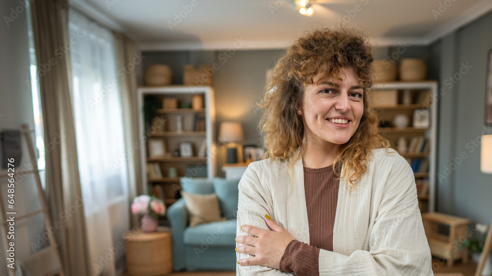 Portrait of one adult caucasian woman at home happy smile curly hair Portrait of one adult caucasian woman at home happy smile curly hair