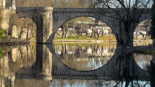 Medieval Sao Goncalo Bridge over the Tamega River in Amarante, Portugal photo