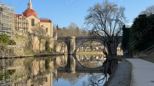 Medieval Sao Goncalo Bridge over the Tamega River in Amarante, Portugal photo