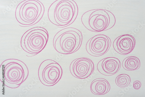 spiral or coil forms in pink color pencil on blank paper