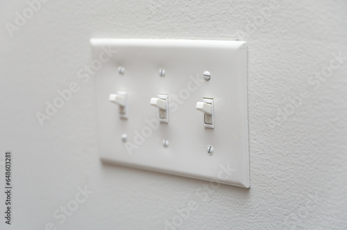 light switch in a dimly lit room, showcasing anticipation, connection, and the power of choice