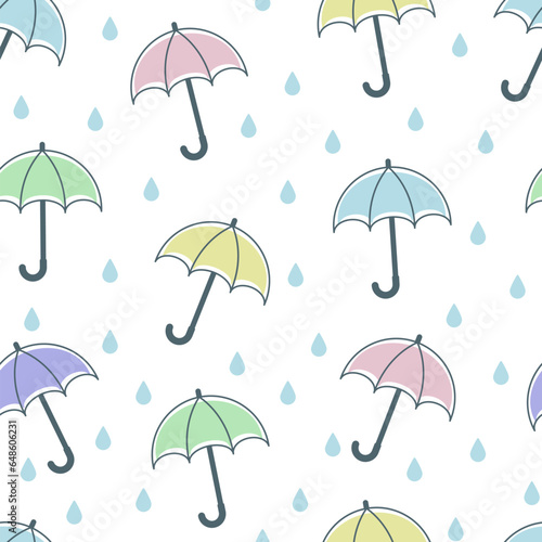 Multicolored umbrellas and raindrops vector seamless pattern © DELYRICA