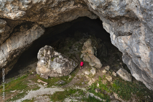Famous paleolithic cave Potocka zijalka on the slope of mountain Olseva, Slovenia photo
