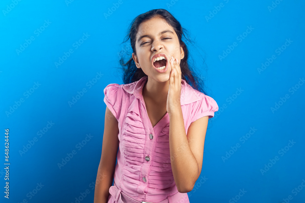 An asian teenage girl have a toothache An asian teenage girl have a toothache