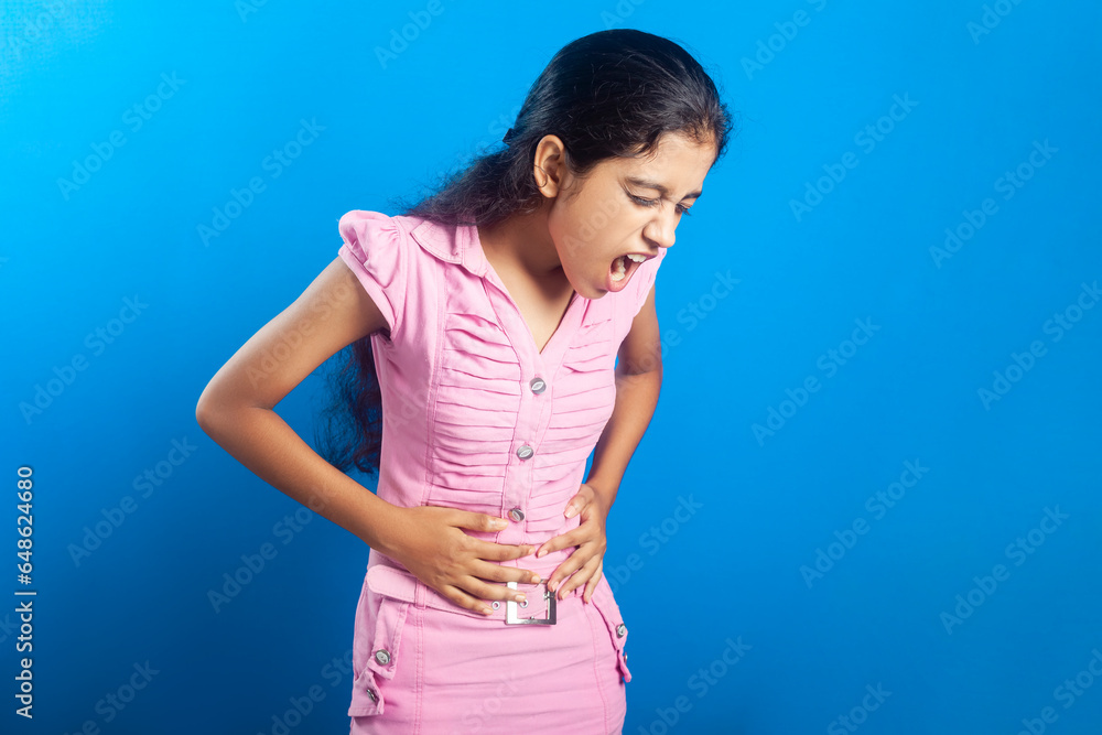Beautiful Indian girl feeling unwell due to stomachache Beautiful Indian girl feeling unwell due to stomachache