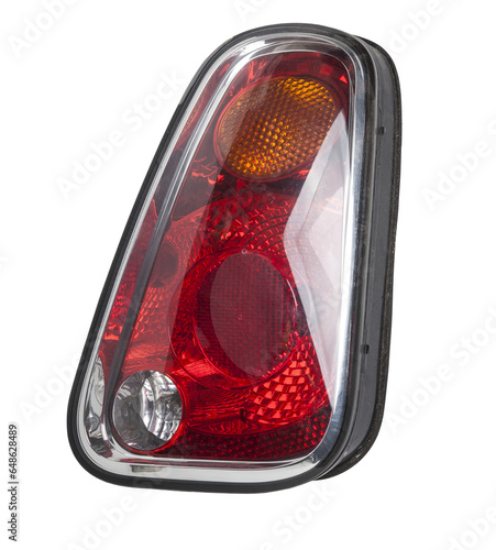 A taillight of a stop signal for a German auto - optical equipment of white and red color on a white isolated background. A spare part for repair and sale in a car service center.