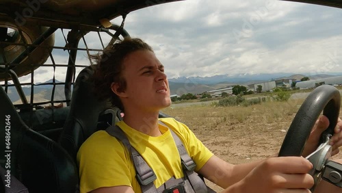Young man driving off road buggy car.
4wd buggy atv utv adventure. Quad buggy vehicles race. Buggy extreme ride. Cholpon-Ata, Kyrgyzstan.