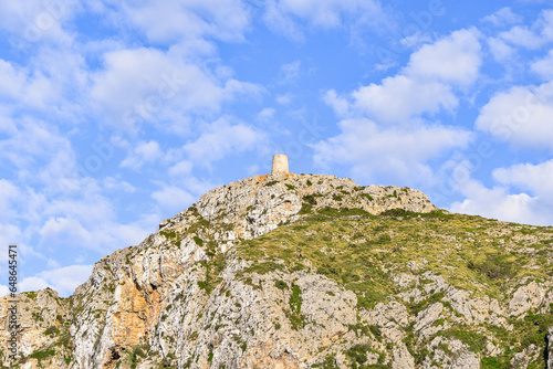 View of a tower on a hill from the top of Mirador es Colomer  Majorque  Spain