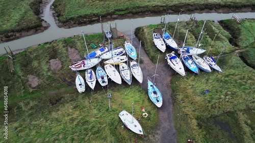 Aerial footage of boats moored inland at Gibraltar Point near Skegness