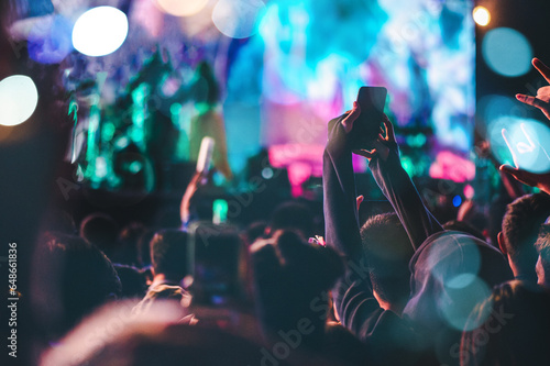 concert, event, audience, festival, entertainment, live, music, nightlife, party, cheer. all audience put hands up in concert event festival entertainment. live music party. let\'s fun and enjoy
