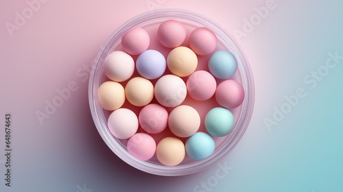 Cosmetic powder in the shape of balls, top view, on flat background with copy space. Creative powder in the form of multicolored pastel balls for the face. © IndigoElf