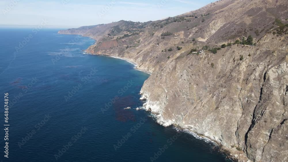 Aerial shot of the rugged coastline along the Pacific Coast Highway in California Aerial shot of the rugged coastline along the Pacific Coast Highway in California