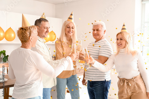 Mature people drinking cham...