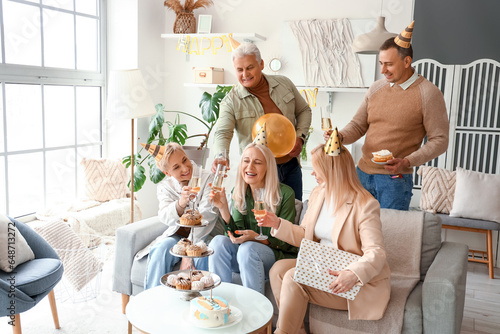 Mature people celebrating B...