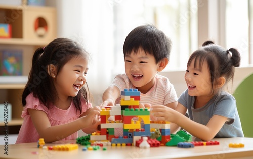 Cute children playing with blockss. entertainment and fun for children. educational toys.