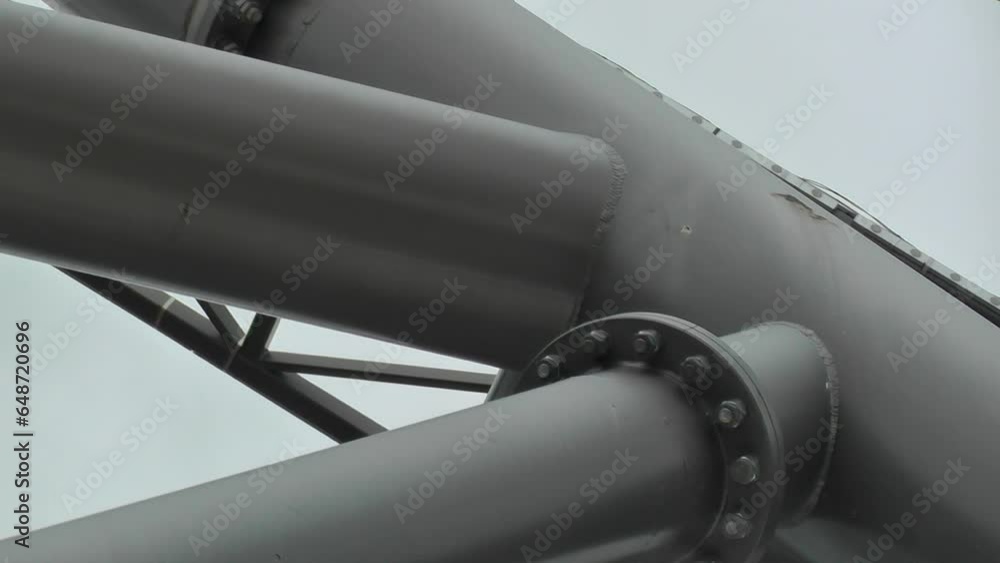 Connections of large metal pipes in close-up Connections of large metal pipes in close-up