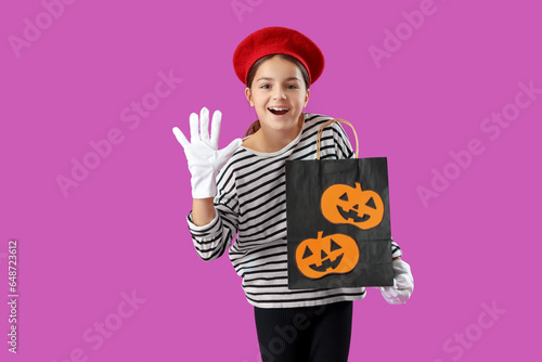 Little girl dressed for Hal...