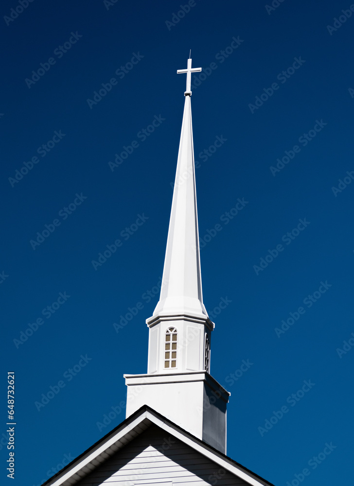 church steeple against blue sky - obrazy, fototapety, plakaty 