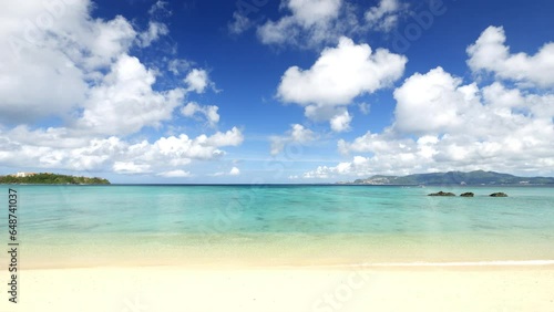 Dramatic view of tropical blue sea or ocean by the white beach and floating clouds in summer, Okinawa in Japan, Nobody, Landscape or travel