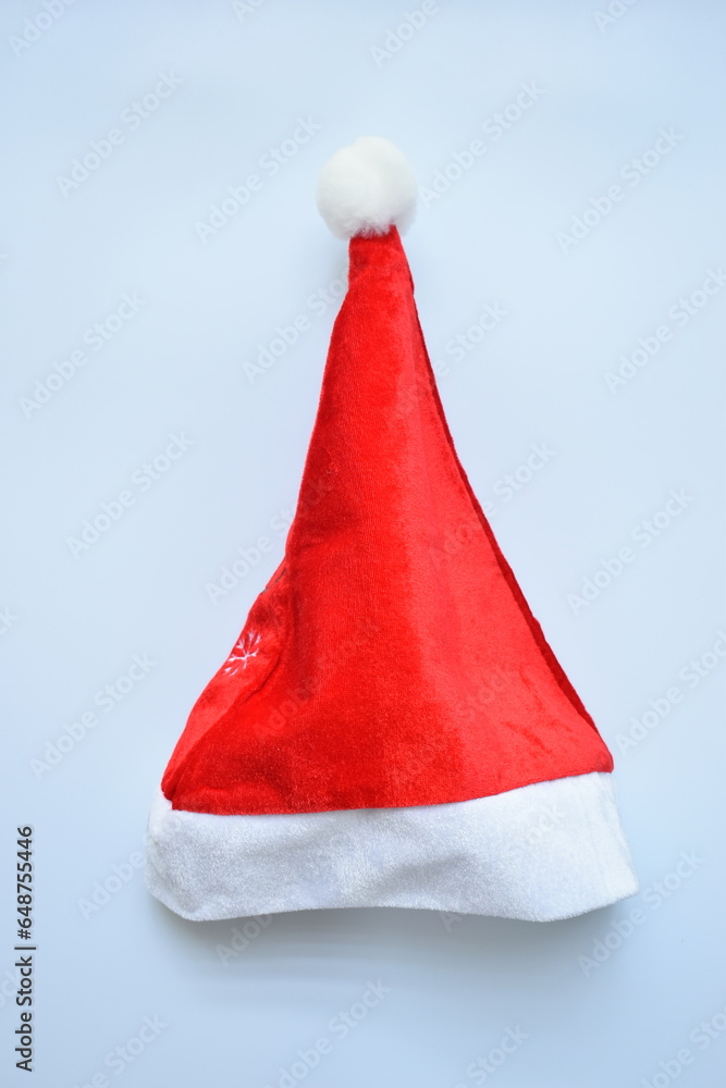 Santa claus red wool winter hat with on white background, christmas decoration Santa claus red wool winter hat with on white background, christmas decoration