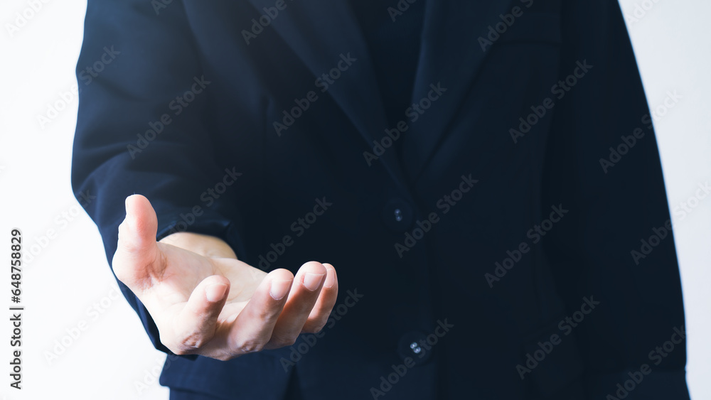Fototapeta premium Business woman empty hand open on white background. Business and financial concept.