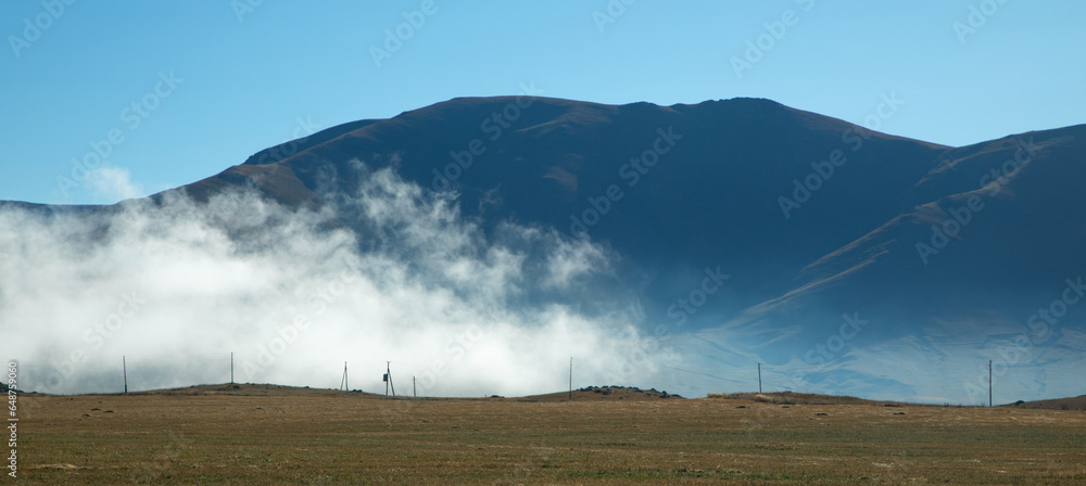 Fototapeta premium Beautiful mountain in mist. Fog