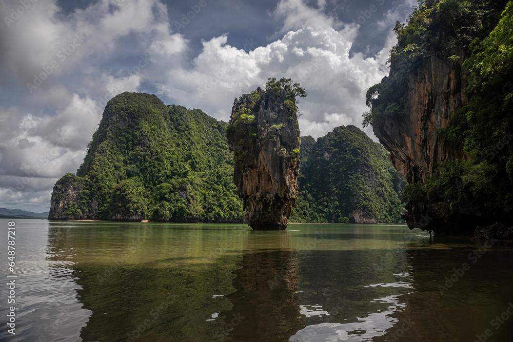 Beautiful little island. Calm sea. Green trees. Pure water. Beautiful little island. Calm sea. Green trees. Pure water.