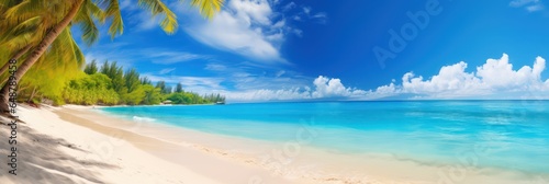 Beautiful tropical beach with white sand, turquoise ocean on background blue sky with clouds on sunny summer day © sitifatimah