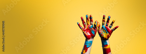 Hands painted with paint symbolizing diversity, unity and multiculturalism, banner cover design. Generative AI