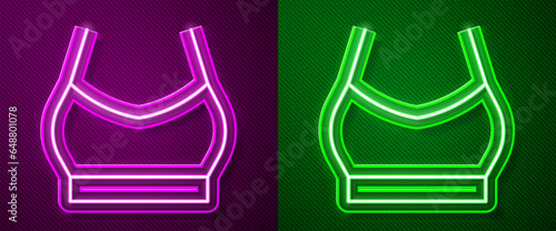 Glowing neon line Female crop top icon isolated on purple and green background. Undershirt. Vector