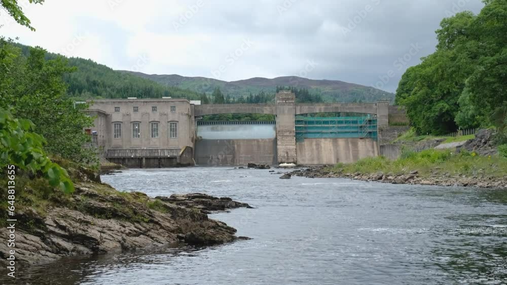 A rocky River Tummel and Pitlochry Dam during a summer in Pitlochry, Scotland A rocky River Tummel and Pitlochry Dam during a summer in Pitlochry, Scotland