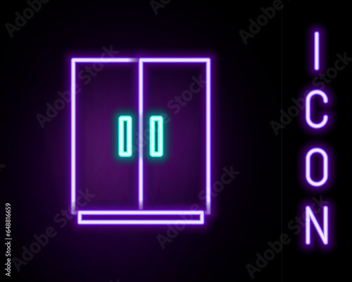 Glowing neon line Wardrobe icon isolated on black background. Colorful outline concept. Vector