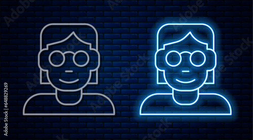 Glowing neon line Hacker or coder icon isolated on brick wall background. Programmer developer working on code, coding, testing, debugging, analysing. Vector