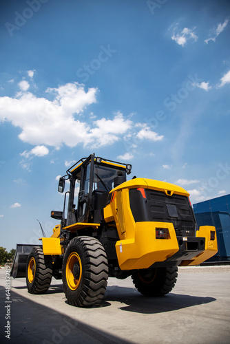 Front wheel loader for use in agriculture and construction