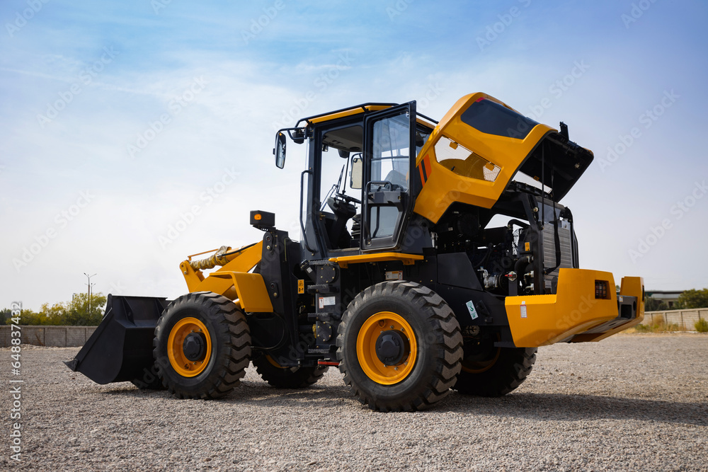 Front wheel loader for use in agriculture and construction