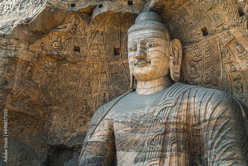 Statue of Buddha in Yungang Grottoes, Datong, China photo